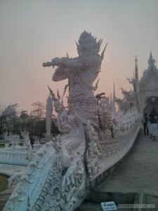 Chiang Rai - white temple entrance demon