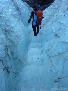 Fox Glacier - guide with pickaxe