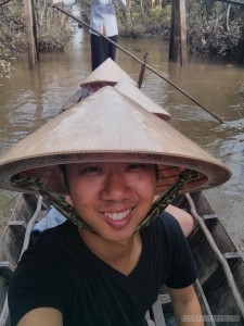 Mekong boat tour - small boat portrait 2