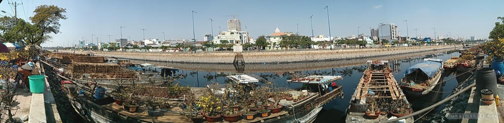 Saigon during Tet - panorama river flower market