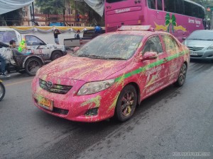 Songkran in Bangkok - paint covered taxi